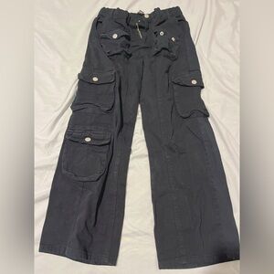 "Essential Black Cargo Jeans – Stylish, Durable, and Versatile"